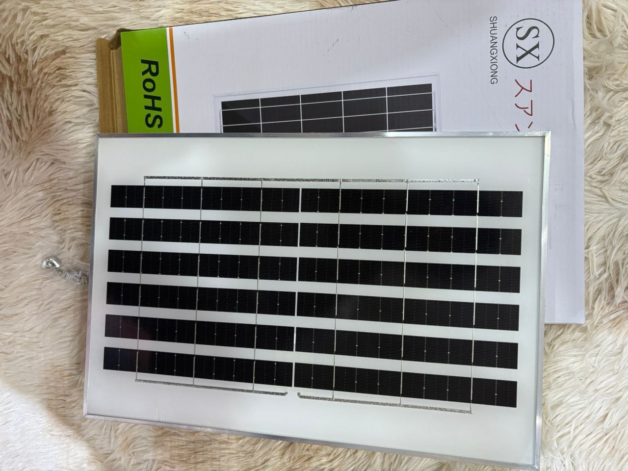 Solar panel with multiple plugs to charge your bulbs, fan, radio ,phones etc